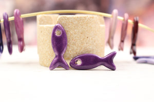 Ceramic fish charms for jewelry and accessories handmade in France by Alain Granell