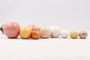 Handmade ceramic beads in various colors