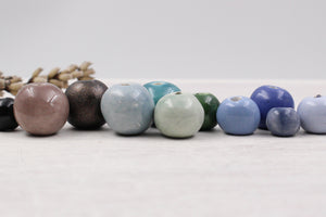 Handmade ceramic beads in various colors
