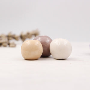 Handmade ceramic beads in various colors