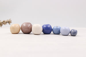 Handmade ceramic beads in various colors