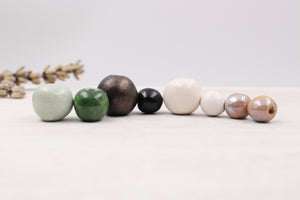 Handmade ceramic beads in various colors