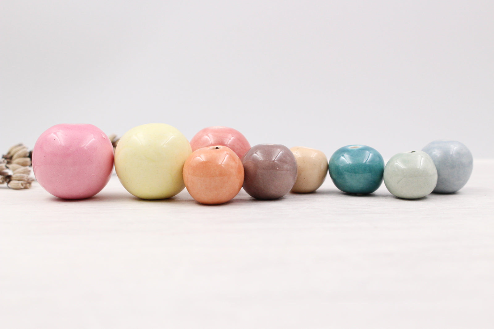 Handmade ceramic beads in various colors