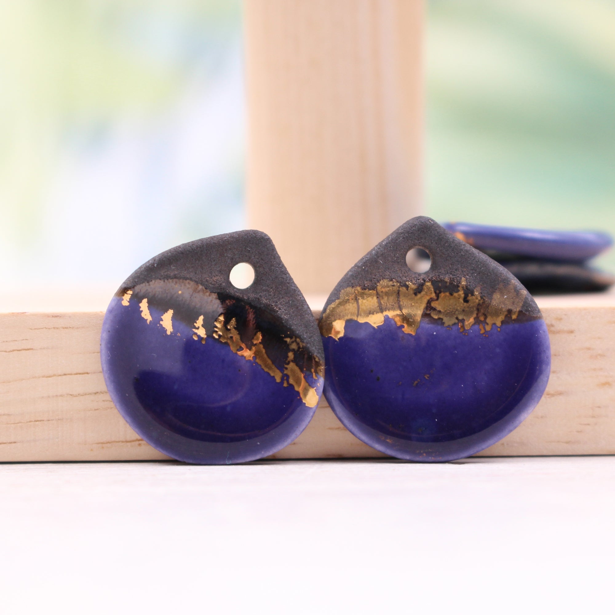 Multicolor ceramic and gold petal charms handmade in France by Alain Granell