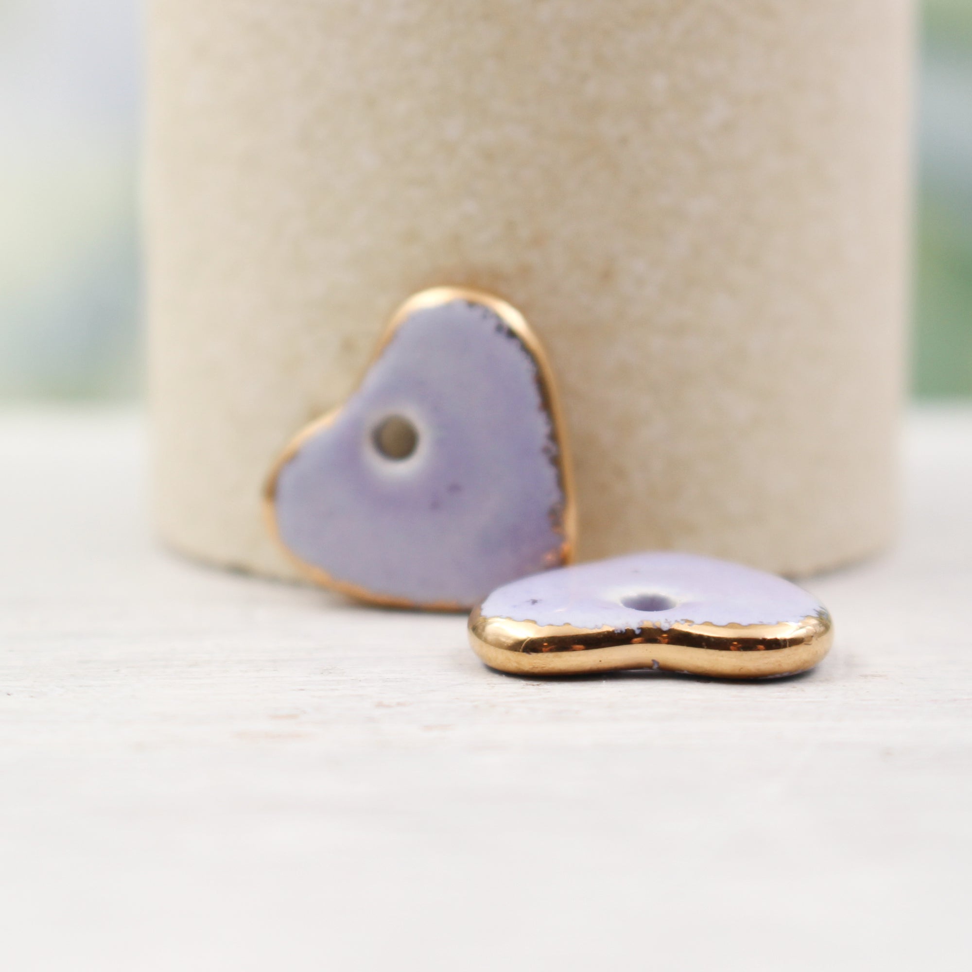 Ceramic heart charms for jewelry and accessories handmade in France by Alain Granell