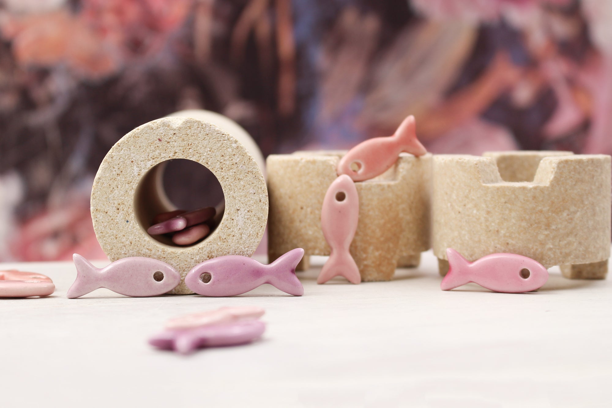 Ceramic fish charms for jewelry and accessories handmade in France by Alain Granell