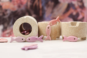 Ceramic fish charms for jewelry and accessories handmade in France by Alain Granell