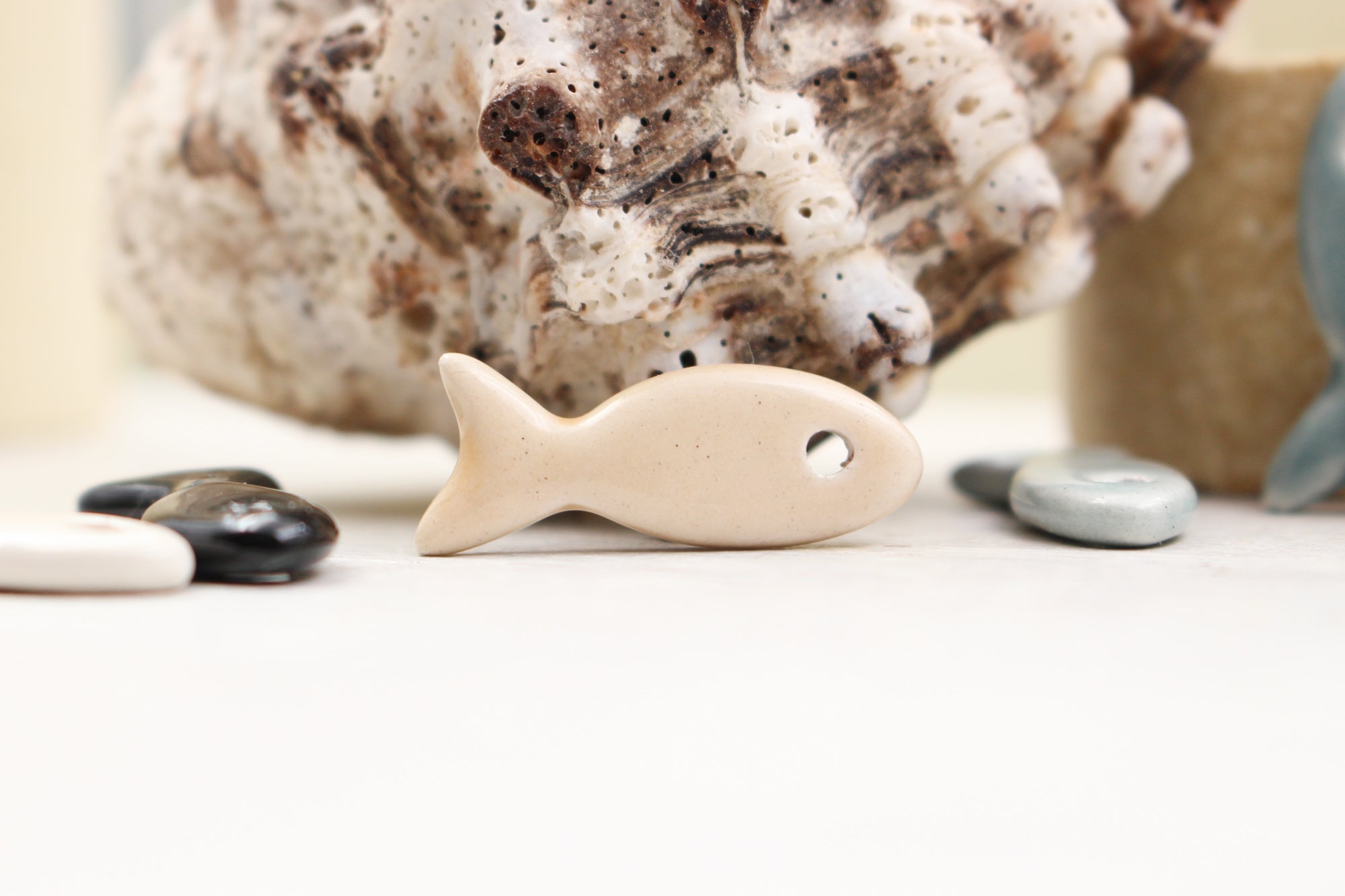 Ceramic fish charms for jewelry and accessories handmade in France by Alain Granell