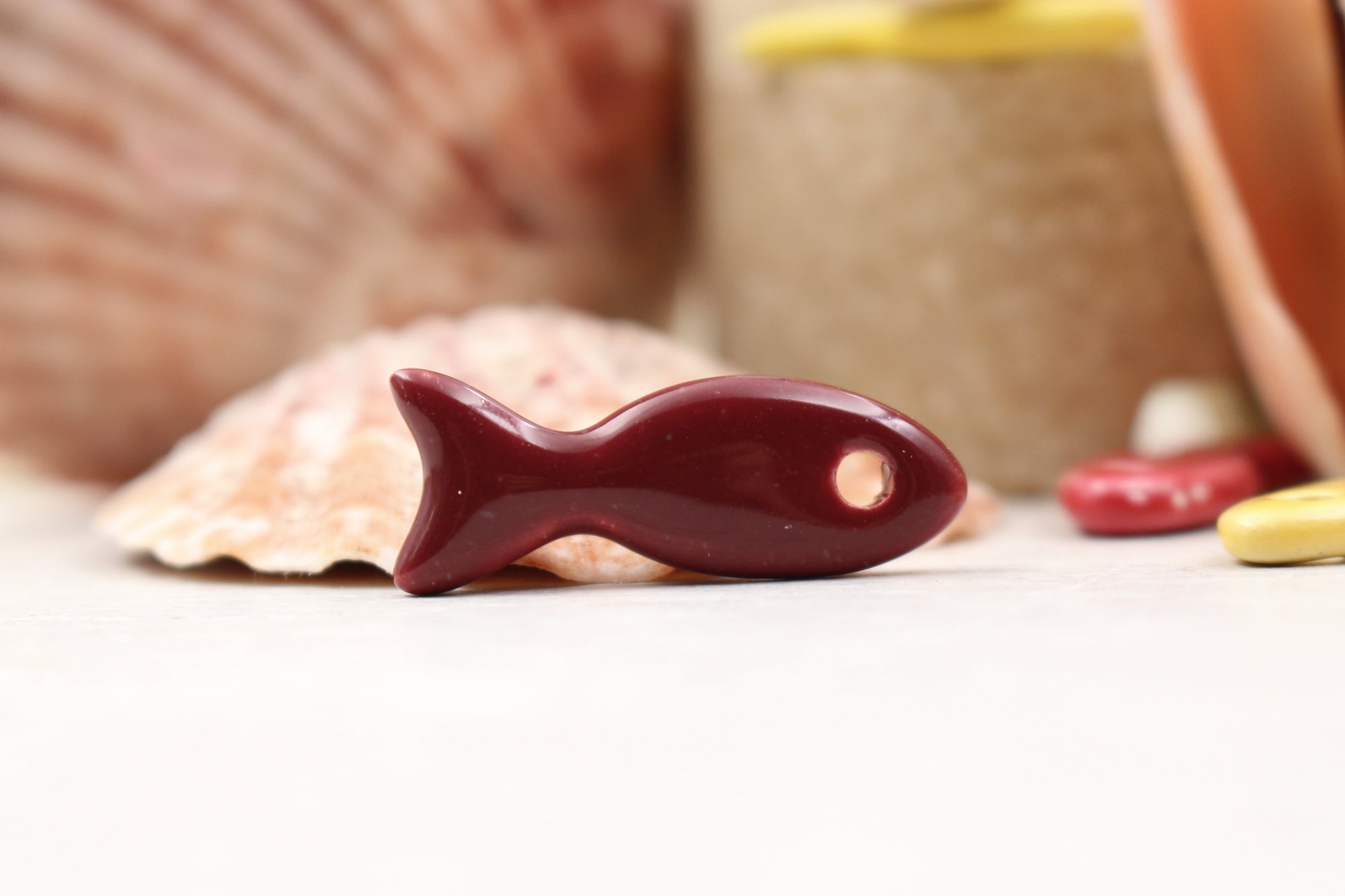 Ceramic fish charms for jewelry and accessories handmade in France by Alain Granell