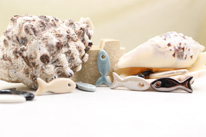 Ceramic fish charms for jewelry and accessories handmade in France by Alain Granell