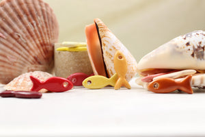 Ceramic fish charms for jewelry and accessories handmade in France by Alain Granell