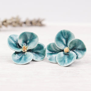 Handmade ceramic poppies for jewelry and accessories making