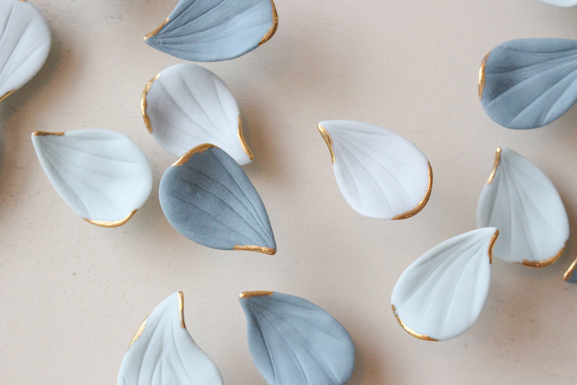 Blue Autumn is a Large porcelain wall art of Blue Leaves handmade in France by Alain Granell
