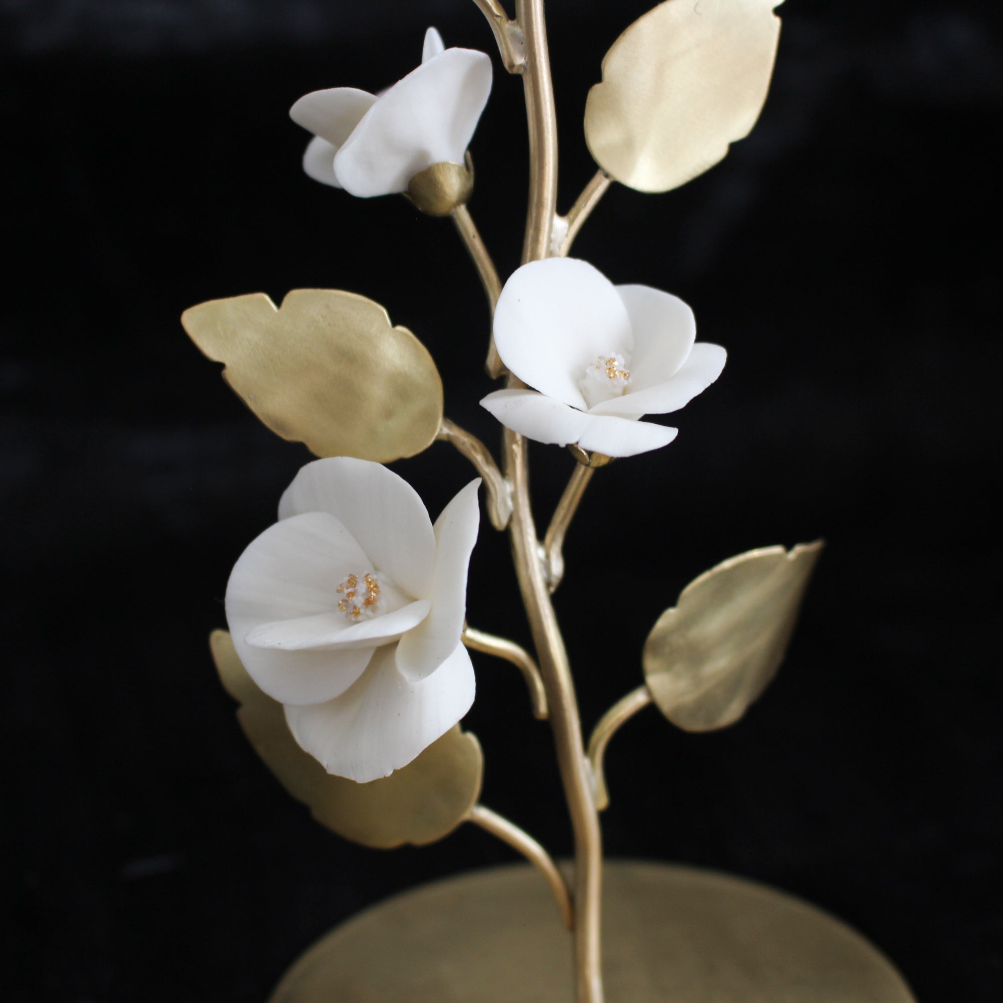 White porcelain flowers on Brass Tree by Alain Granell