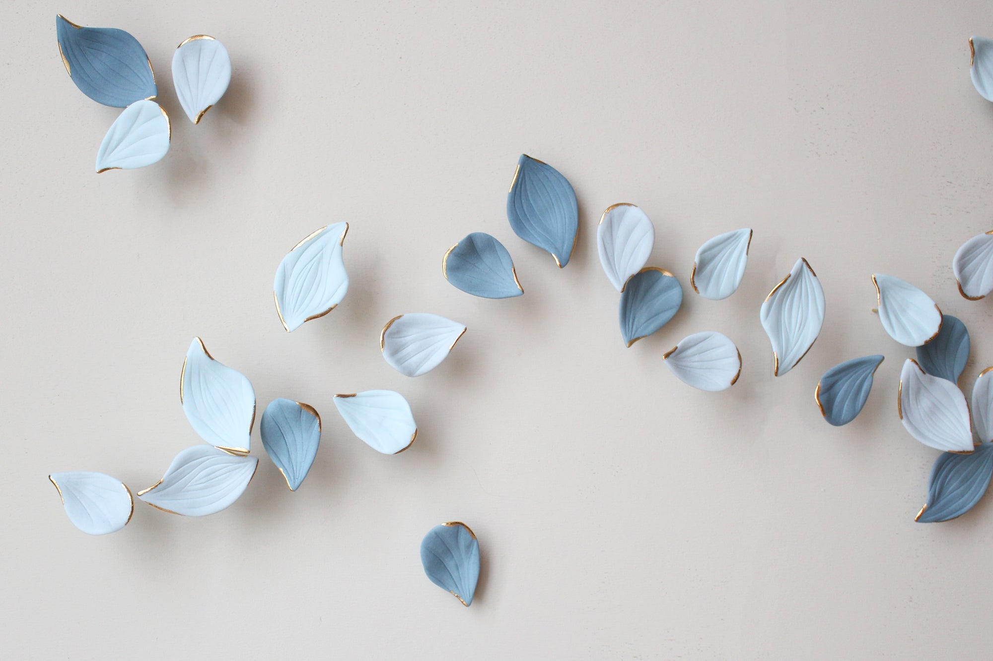 Blue Autumn is a Large porcelain wall art of Blue Leaves handmade in France by Alain Granell
