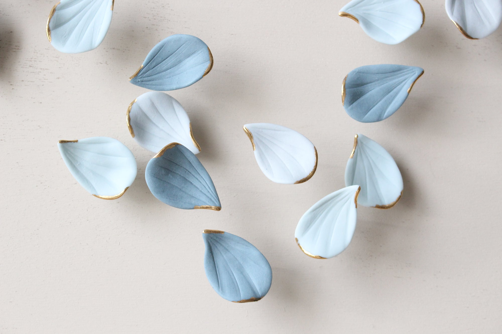 Blue Autumn is a Large porcelain wall art of Blue Leaves handmade in France by Alain Granell