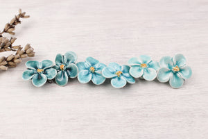 Primevères faites à la main en céramique pour création de bijoux et accessoires