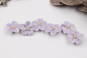 Breloques primevères en céramique fabriquées à la main en France pour création de bijoux et accessoires