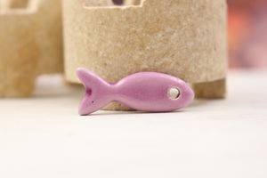 Ceramic fish charms for jewelry and accessories handmade in France by Alain Granell