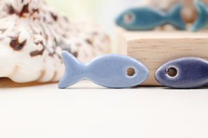 Ceramic fish charms for jewelry and accessories handmade in France by Alain Granell