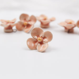 Handmade ceramic clovers for jewelry and accessories making