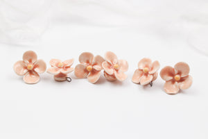 Handmade ceramic clovers for jewelry and accessories making