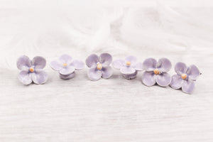 Handmade ceramic clovers for jewelry and accessories making