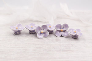 Handmade ceramic clovers for jewelry and accessories making