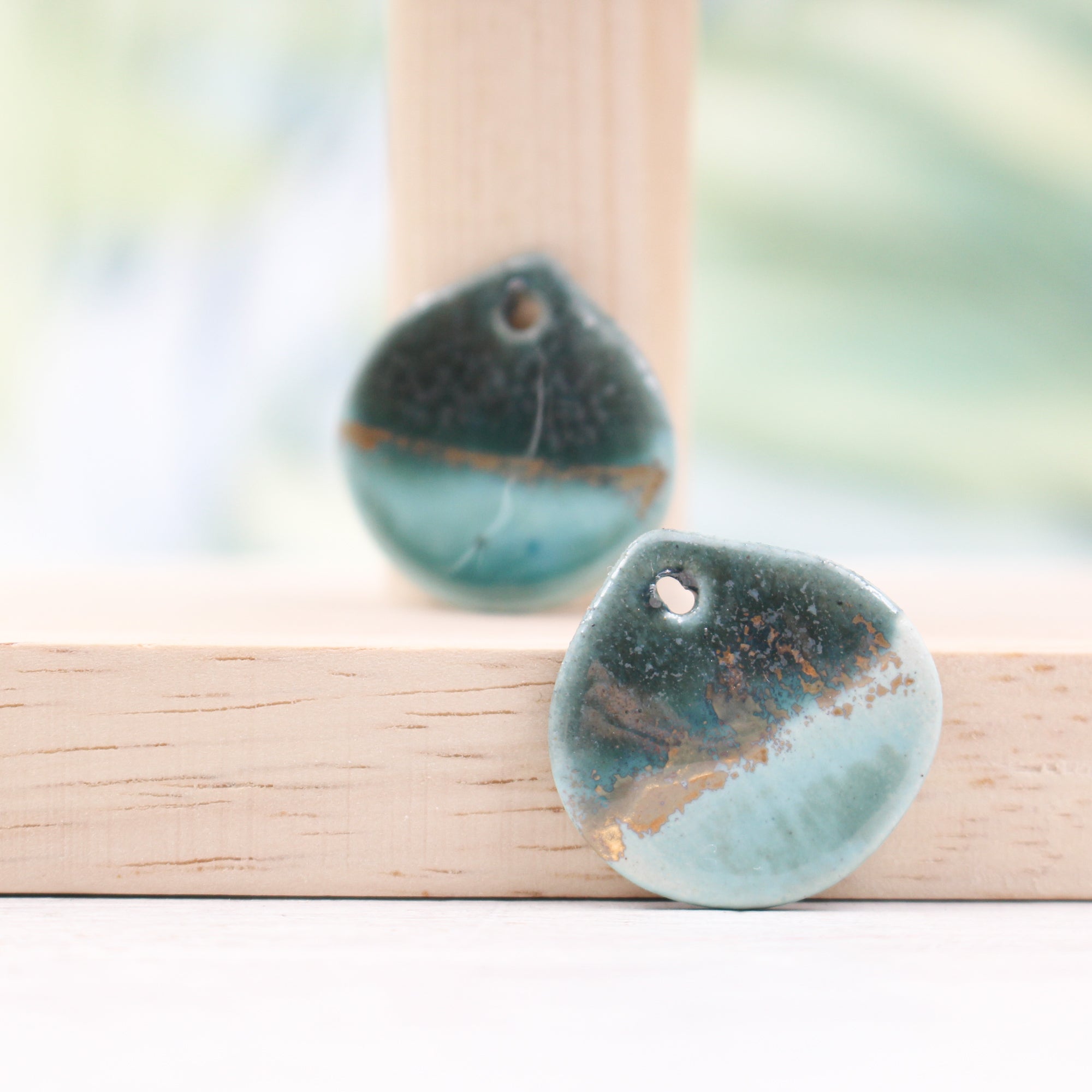 Multicolor ceramic and gold petal charms handmade in France by Alain Granell