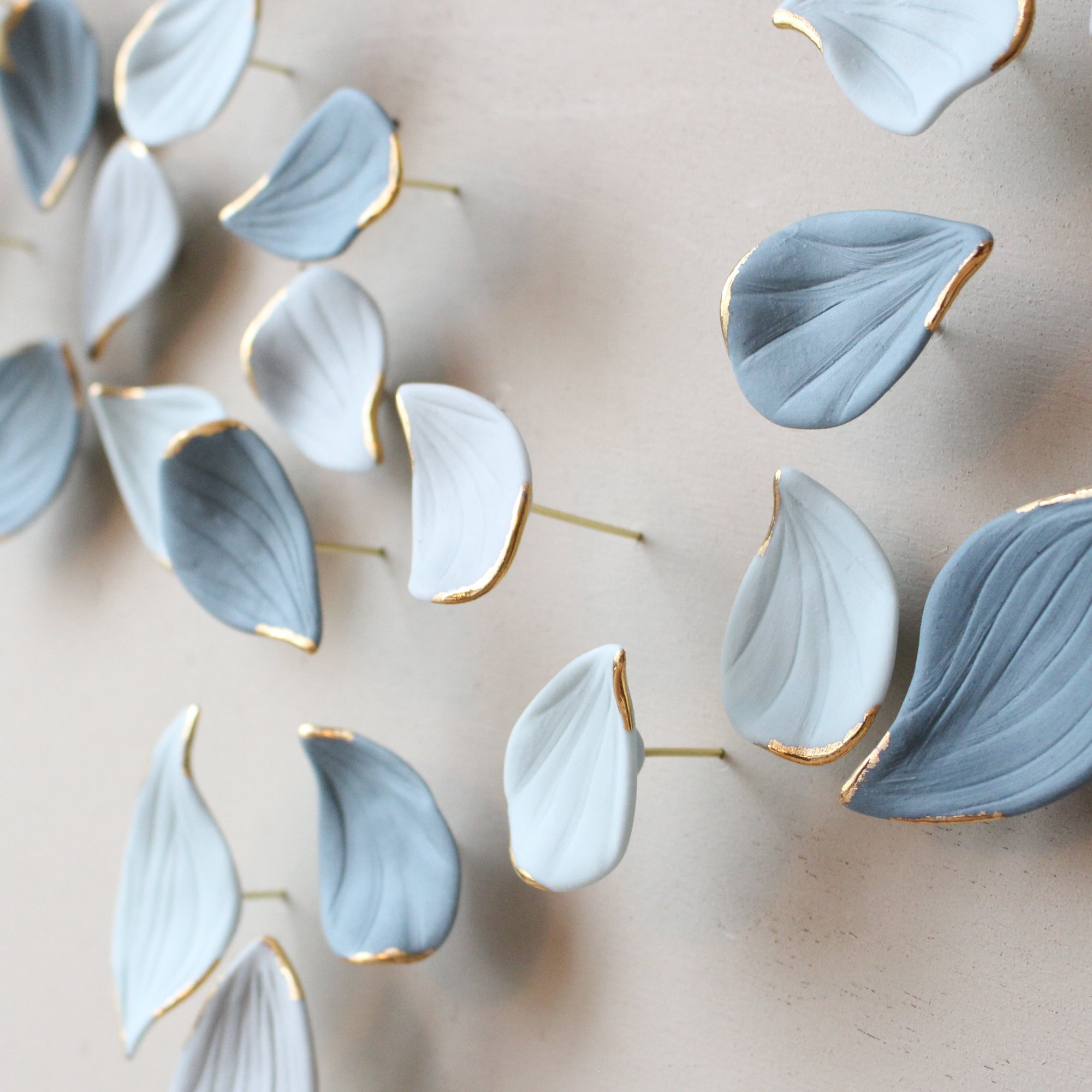 Blue Autumn is a Large porcelain wall art of Blue Leaves handmade in France by Alain Granell