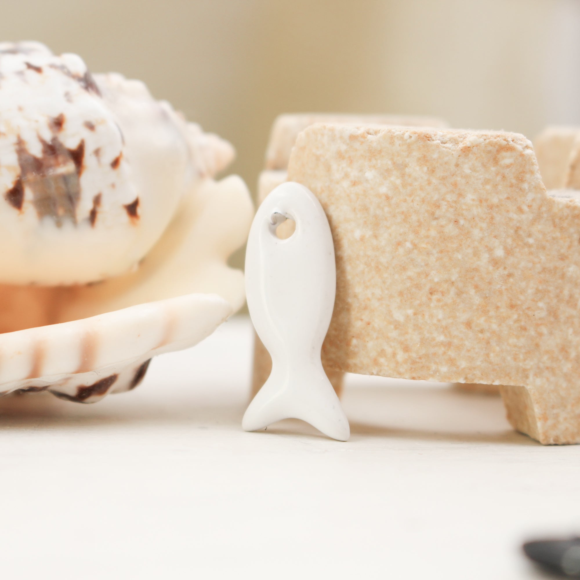 Ceramic fish charms for jewelry and accessories handmade in France by Alain Granell