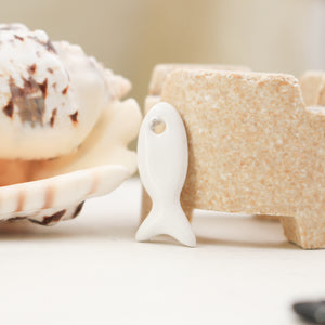Ceramic fish charms for jewelry and accessories handmade in France by Alain Granell