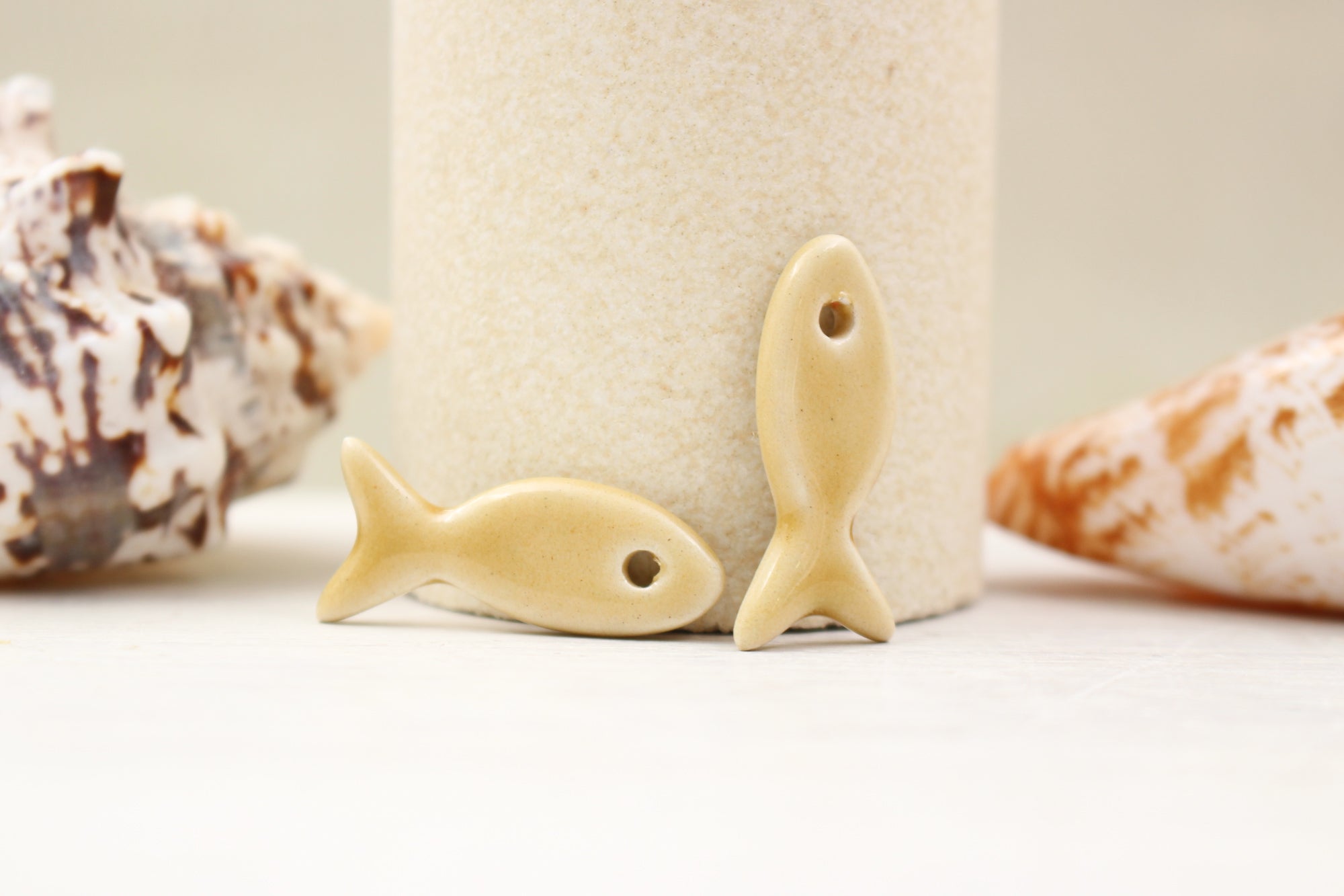 Ceramic fish charms for jewelry and accessories handmade in France by Alain Granell
